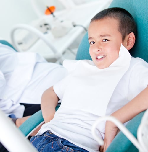 Happy kid visiting the dentist and taking good care of his teeth-1