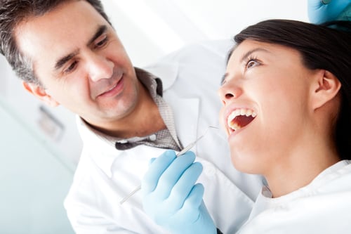 dentist with patient