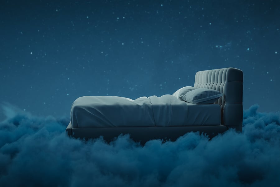 3d rendering of bed over fluffy clouds at night