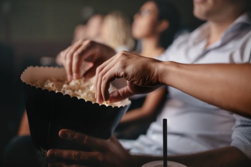 people eating popcorn